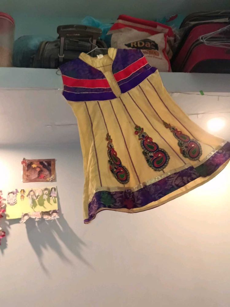 Elegant Yellow Kurta with Embellishments