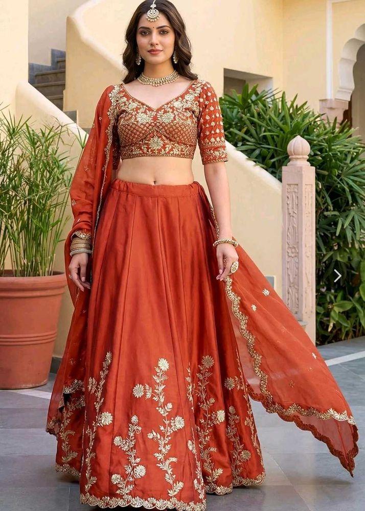 Elegant Orange Embroidered Lehenga Choli