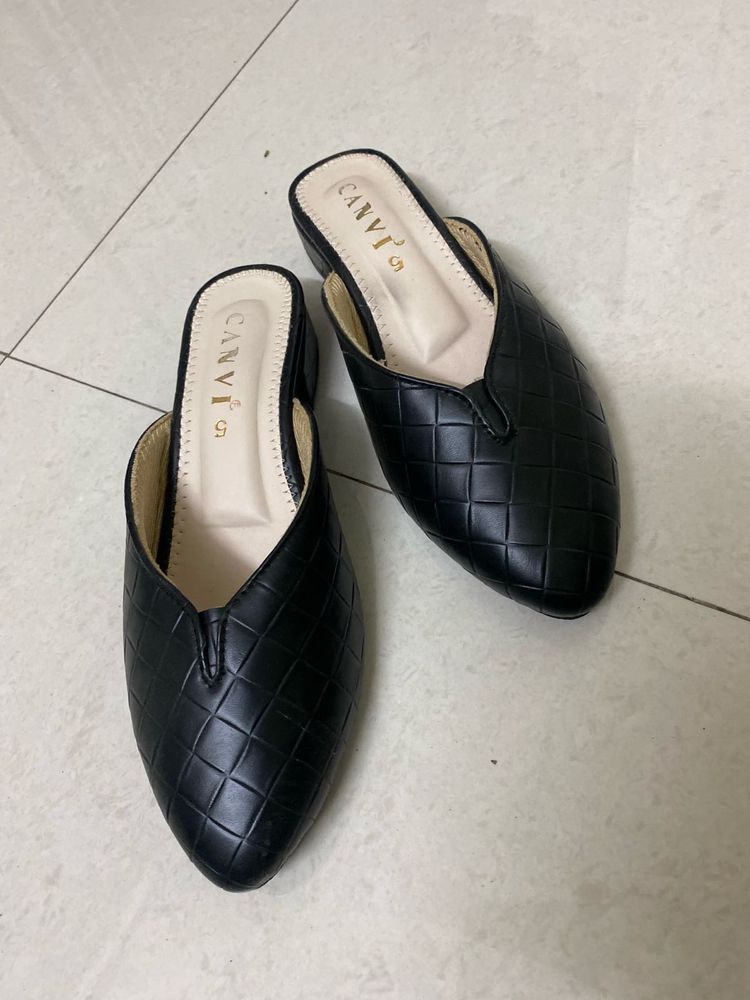 Black Mules Flats