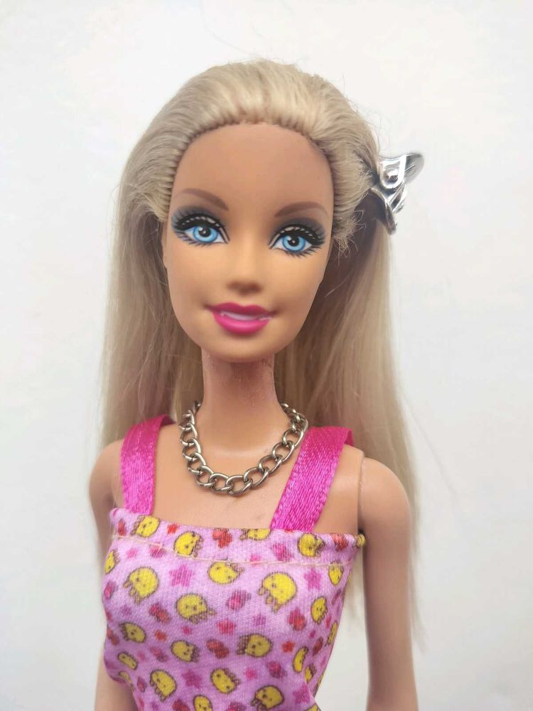 Barbie doll with pink dress