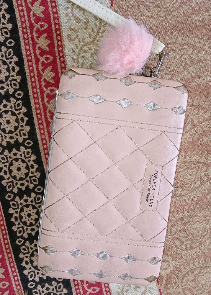 Quilted Pink Clutch with Pom Po