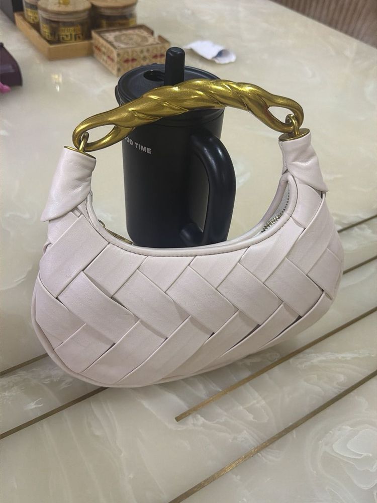 Chic Woven Handbag with Gold Handle
