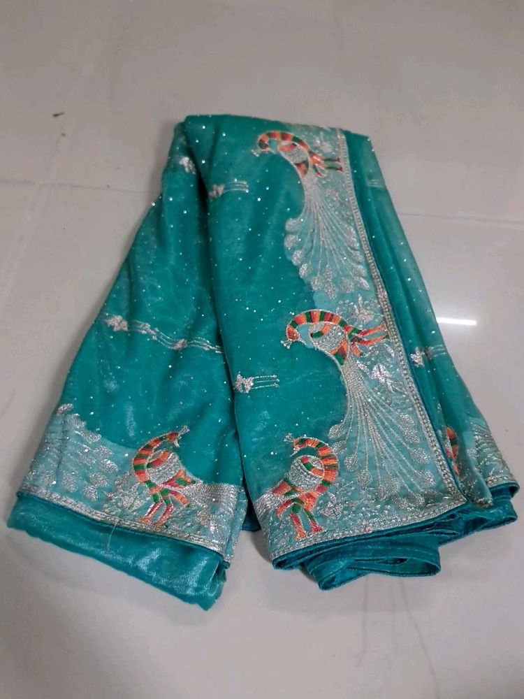 Stunning Teal Embroidered Peacock Saree