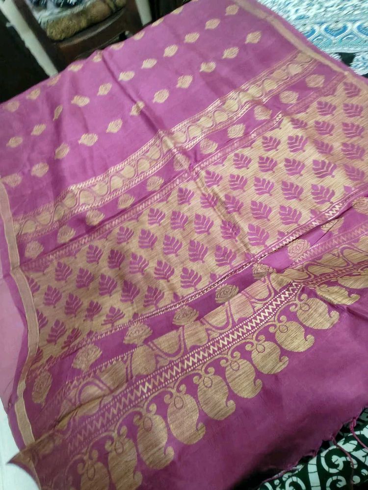 Elegant Pink Saree with Golden Motifs