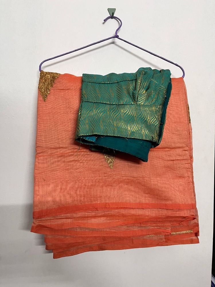 Orange Saree with Teal Blouse