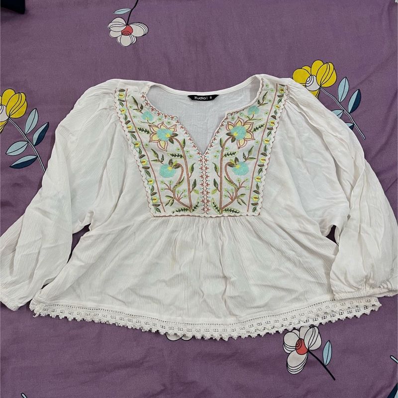 Embroidered White Peplum Top