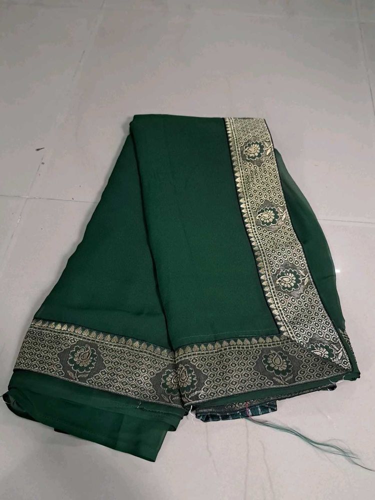 Elegant Green Saree with Gold Border