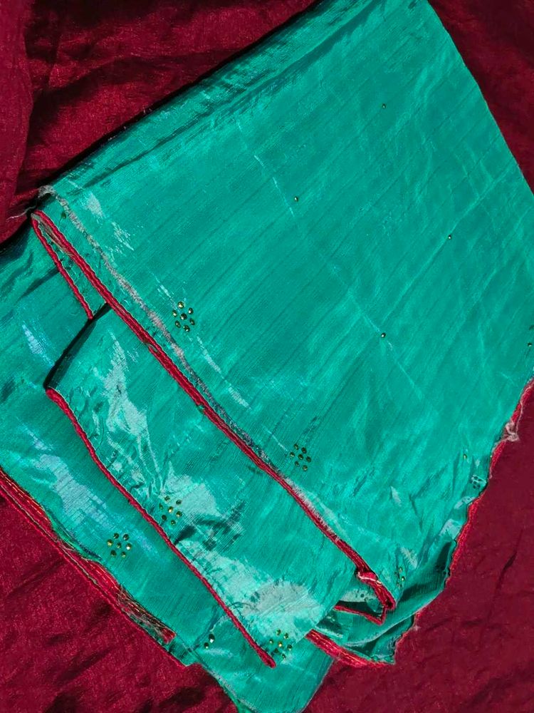 Beautiful Teal Saree with Red Border