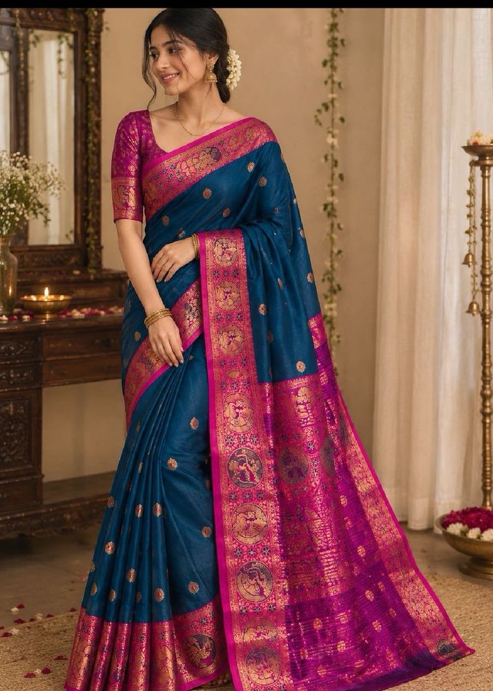 Stunning Teal Saree with Pink Border
