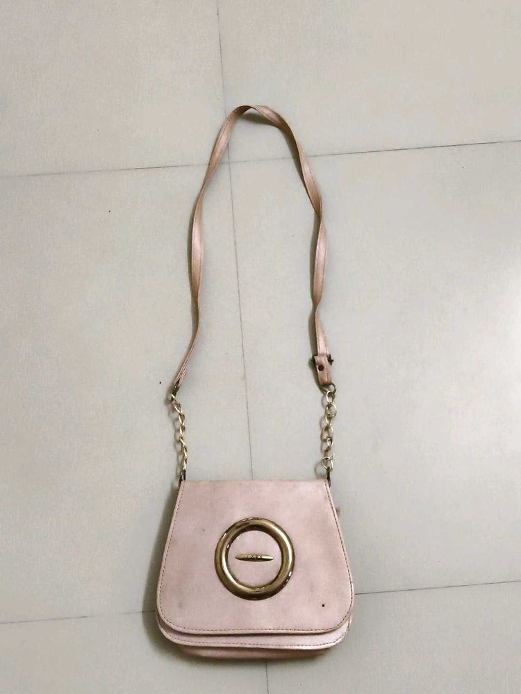 Chic Pink Crossbody Bag with Gold Accents