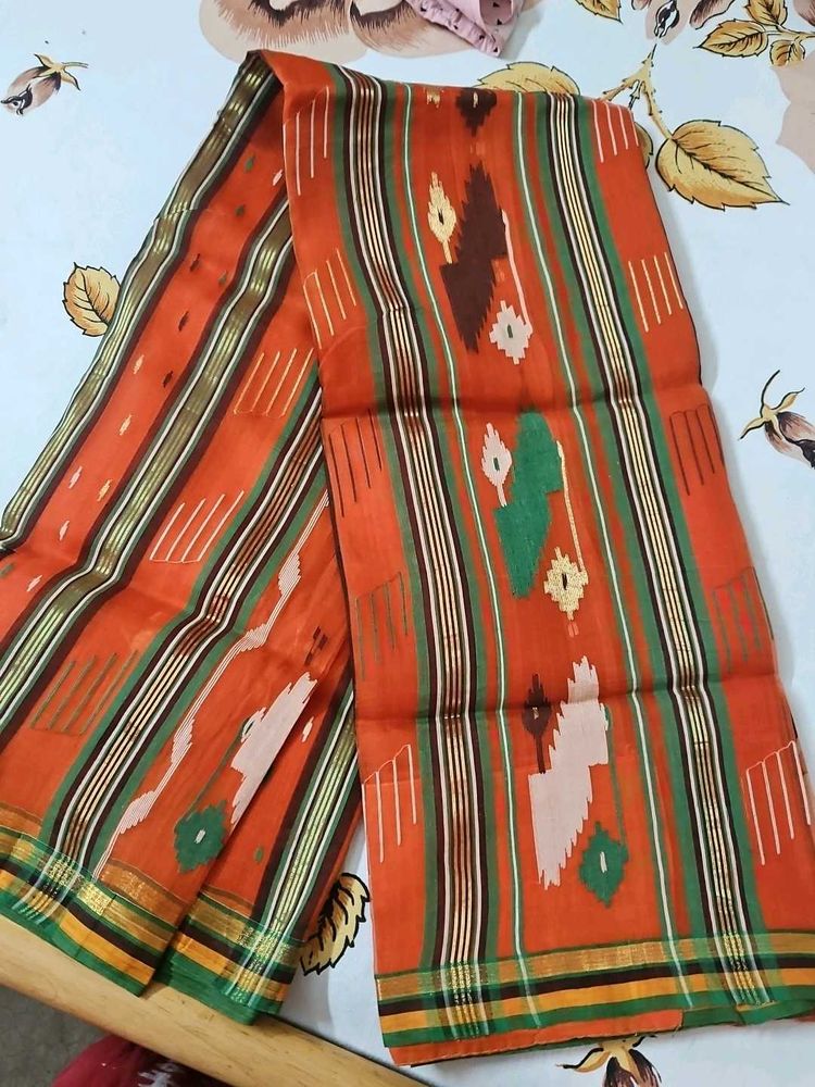 Vibrant Orange Saree with Geometric Pattern