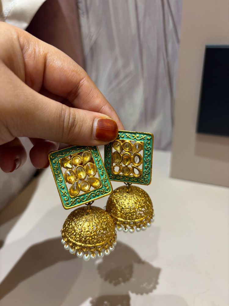 Exquisite Jhumka Earrings with Green Detail