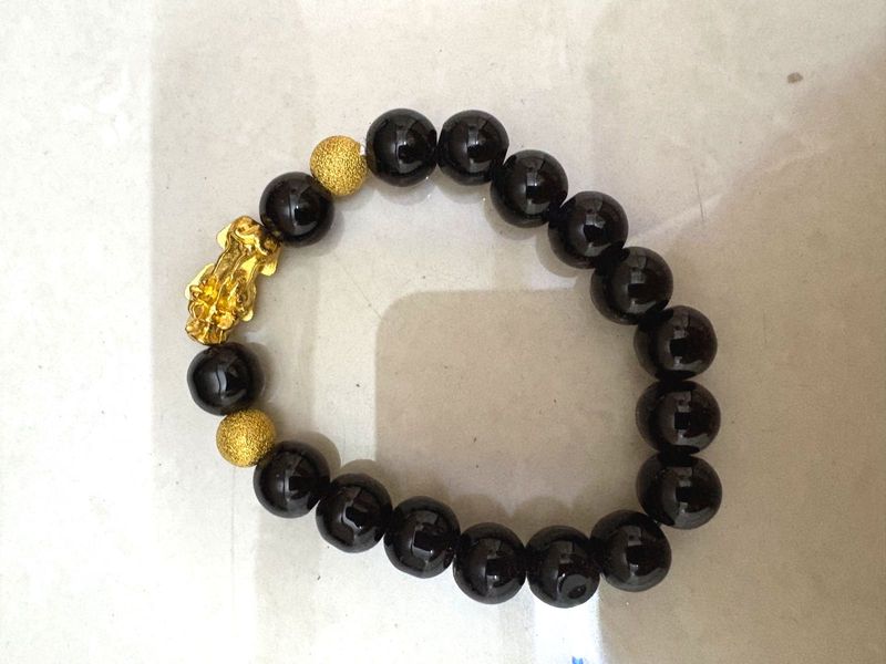 Black Beaded Bracelet with Gold Charm