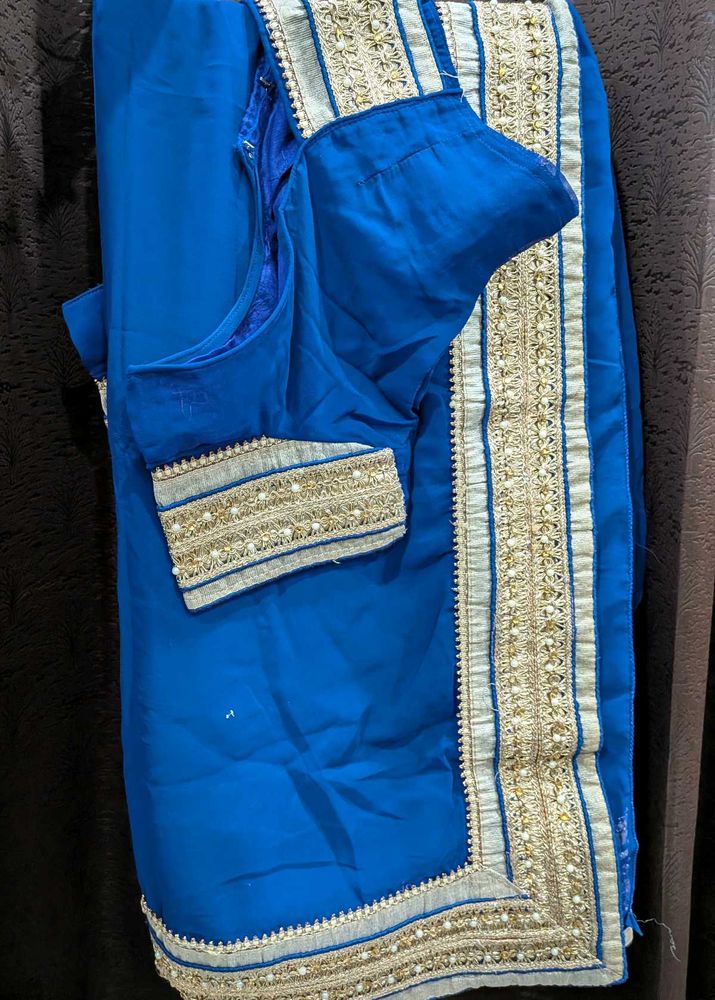 Elegant Blue Saree with Embellished Blouse