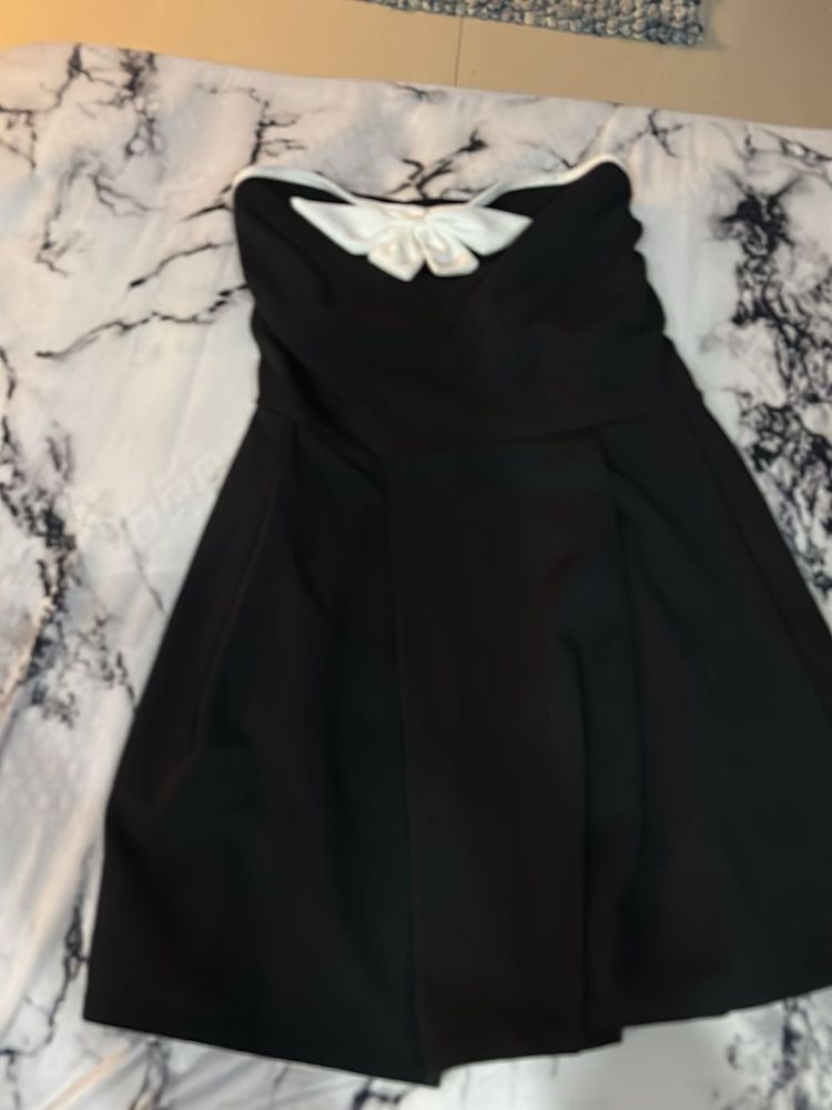 Chic Black Strapless Dress with Bow Detail