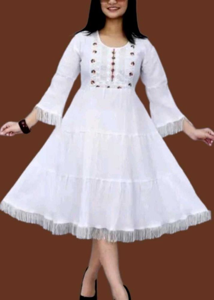 Elegant White Tiered Kurta with Tassels