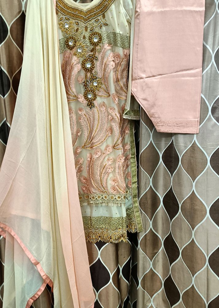Peach Colour Three Piece Stitch Suit