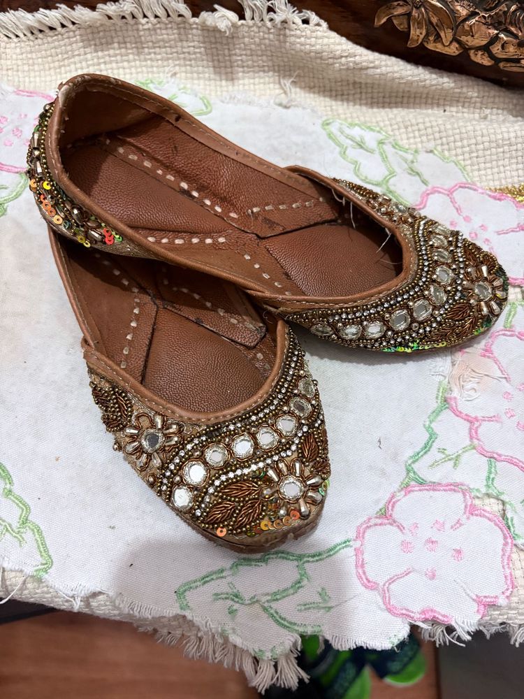 Embellished golden traditional Juttis