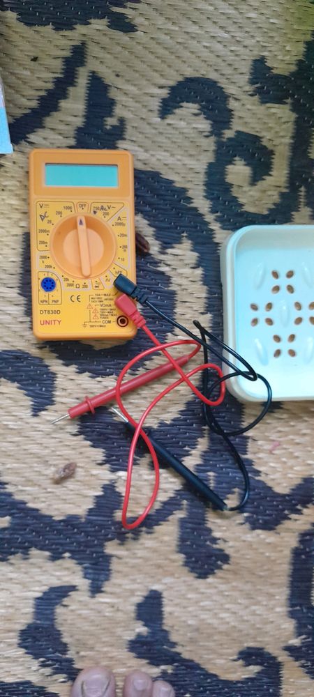 Multimeter And Saban Box And Blothot Bard And Pen And Eear Clener