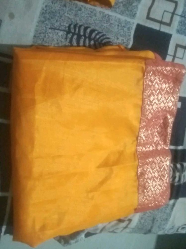 Vibrant Yellow Saree with Ornate Border
