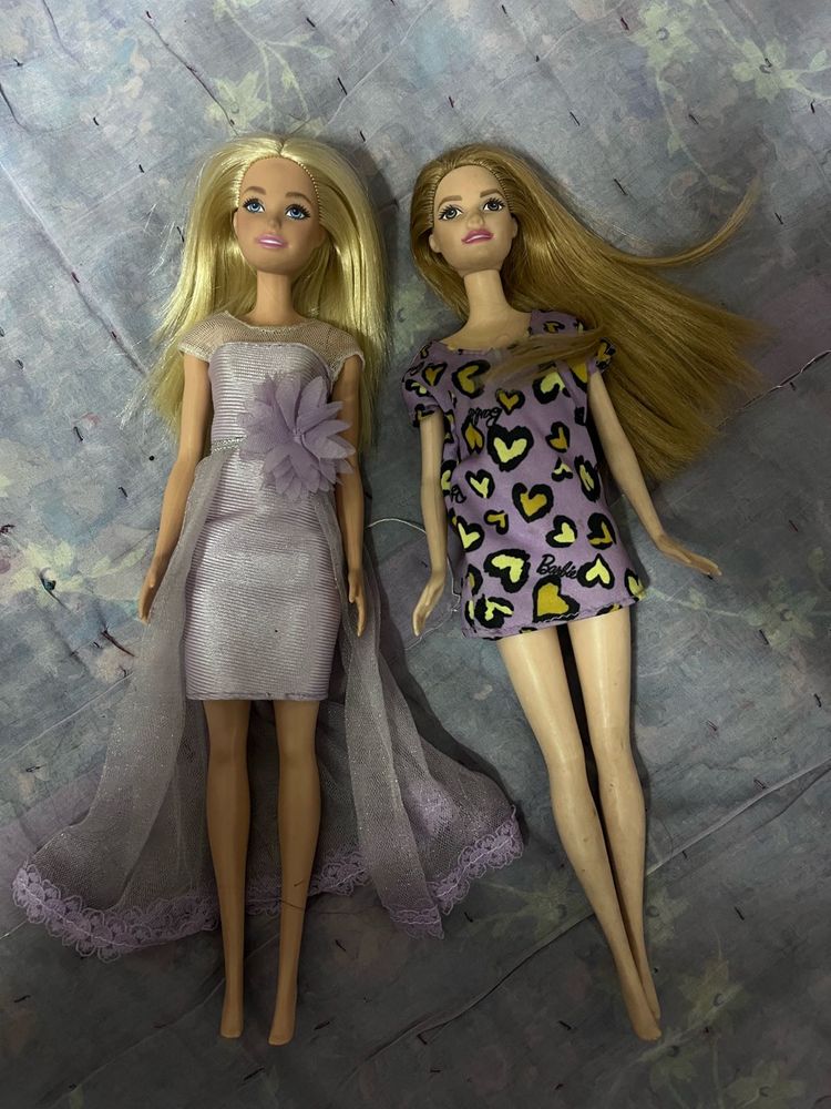 Two Barbie Dolls with Dresses