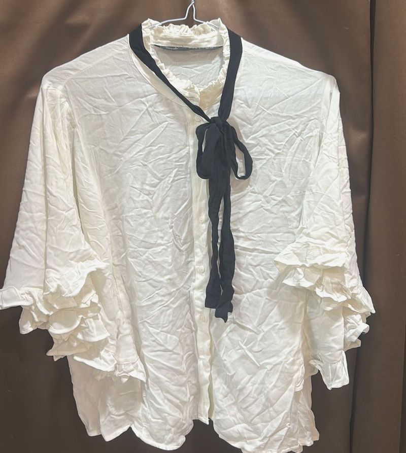 Elegant White Top with Black Ribbon