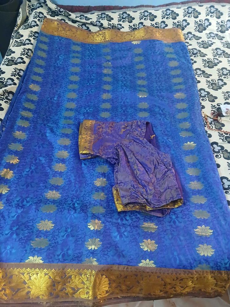 Vibrant Blue Saree with Gold Border