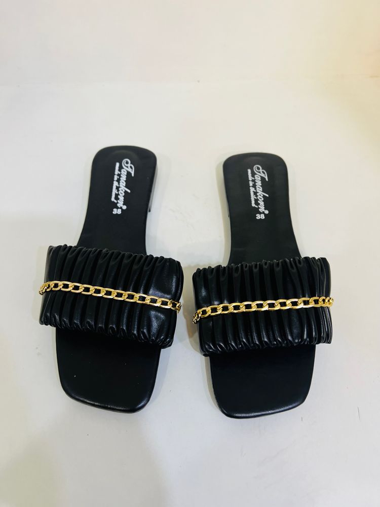 brand new black flip flops