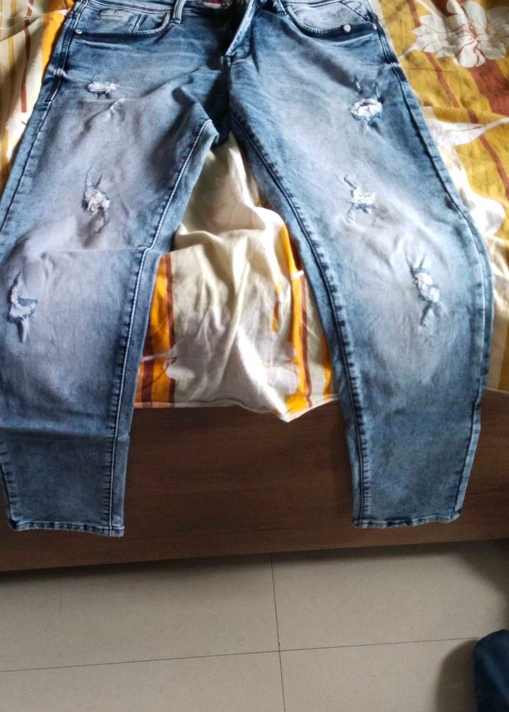 Men's Distressed Blue Jeans