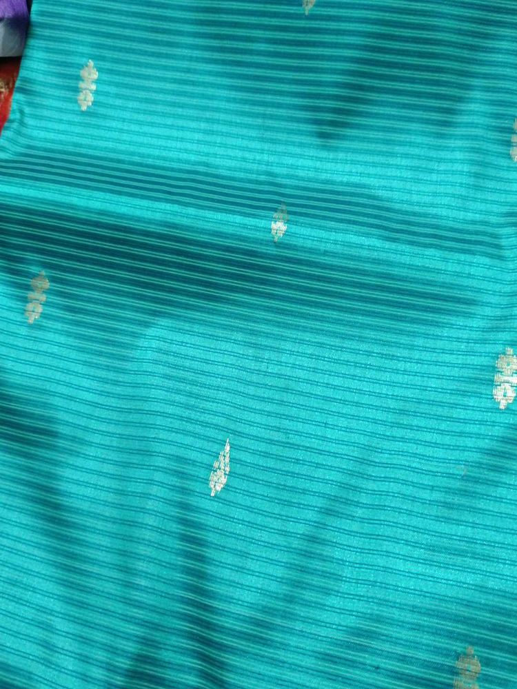 Elegant Teal Saree with Gold Motifs