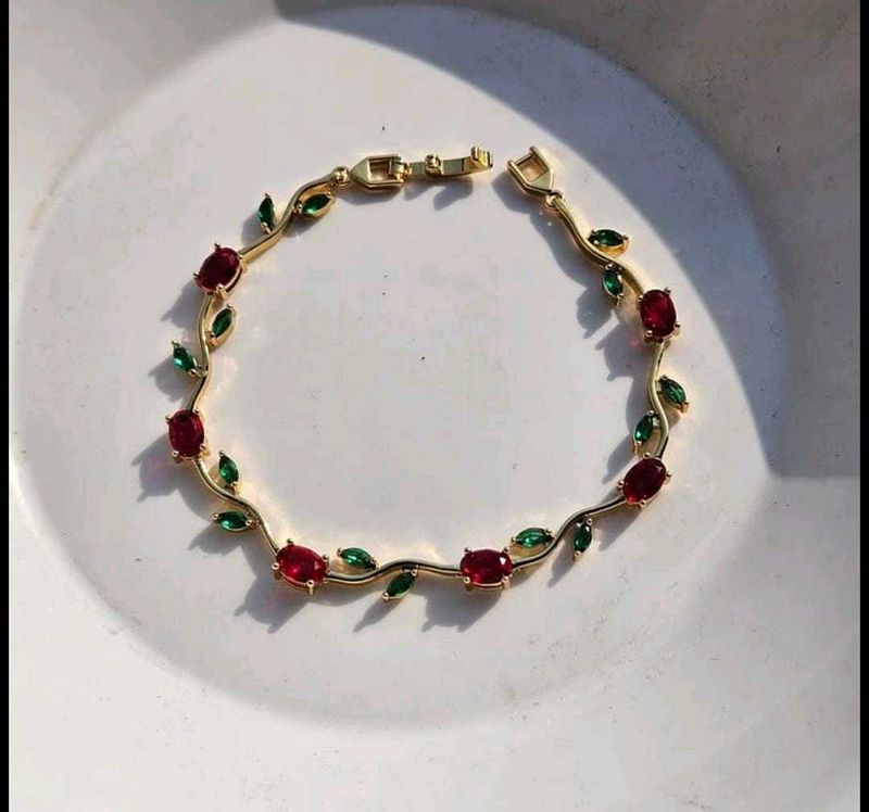 Elegant Gold Bracelet with Red &amp; Green Stones