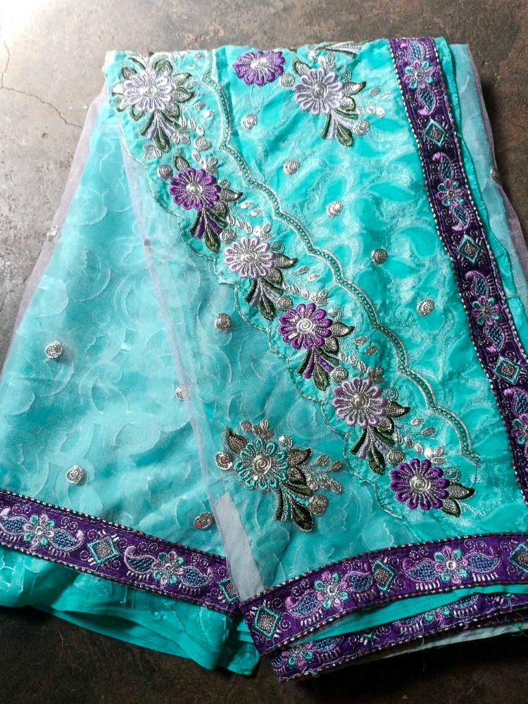 Beautiful Embroidered Teal Saree
