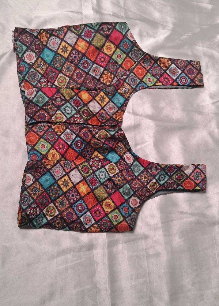 multi colour sleeveless blouse