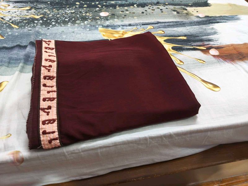 Maroon saree with Embroidered Border