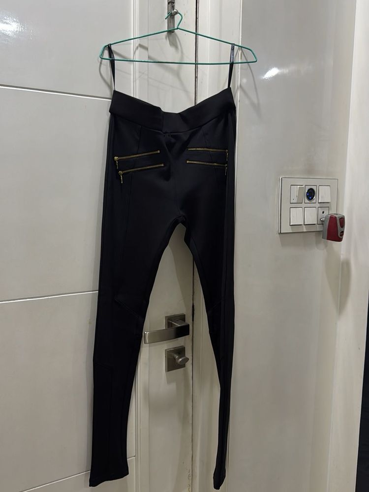 Chic Black Leggings with Gold Zippers