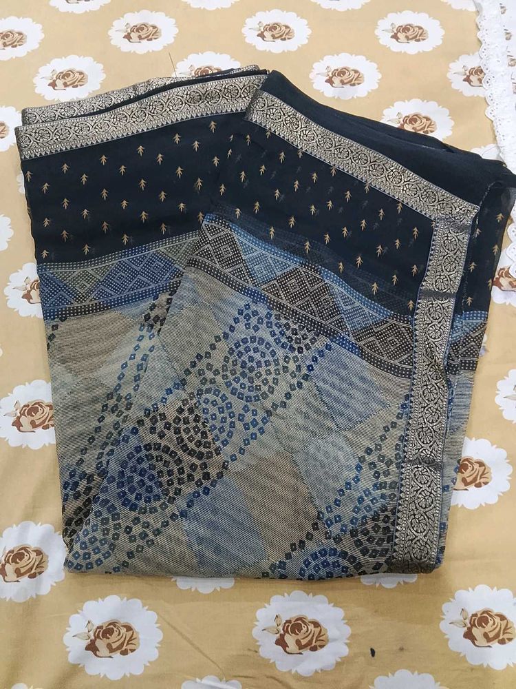Elegant Black Saree with Blue Bandhej  Print