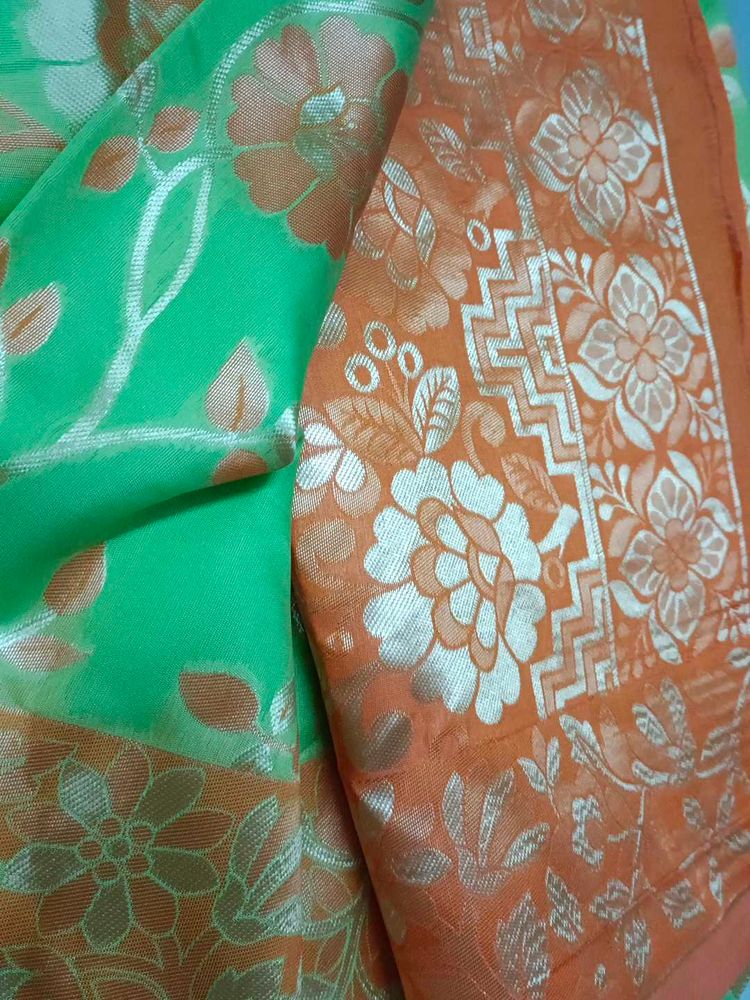 A New Saree In Green n Orange Shade