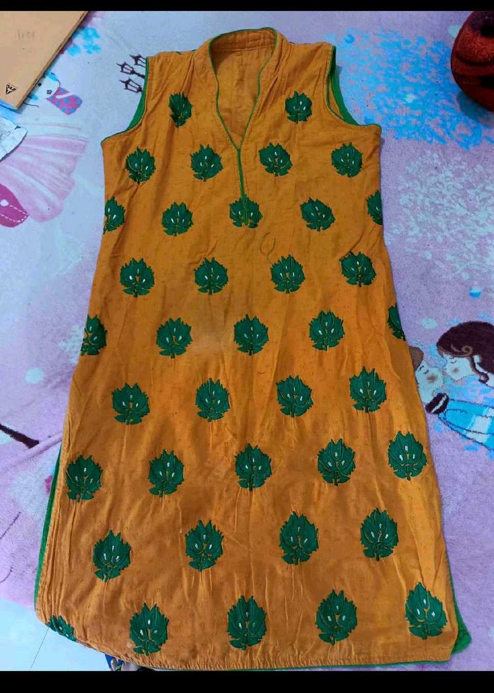 Orange Kurti with Green Leaf Print
