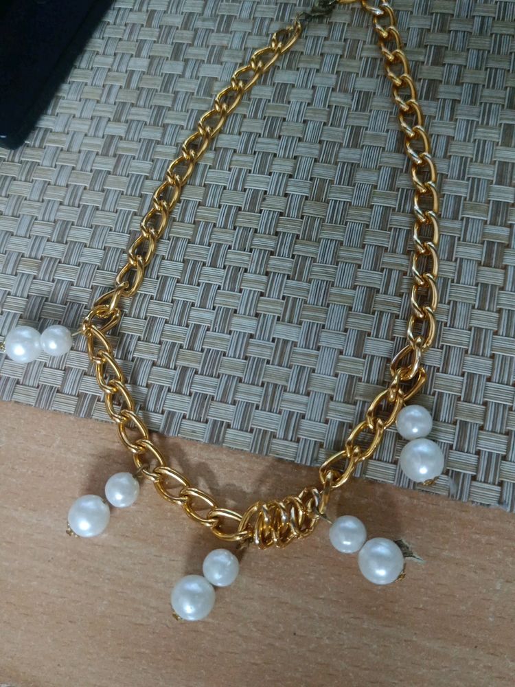 gold metal chain with beads