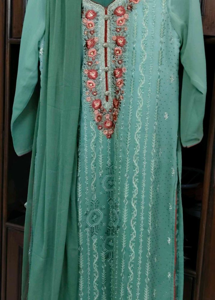 Beautifully Embellished Teal Kurta Set