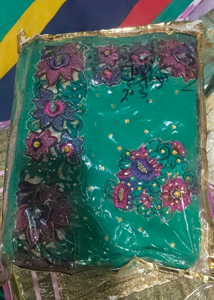 Beautiful Embroidered Teal Saree
