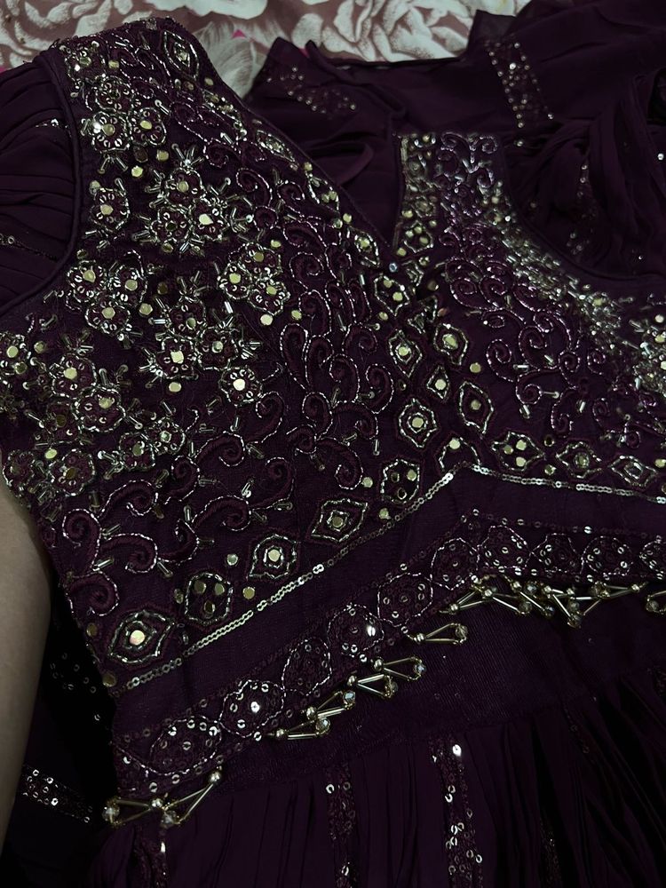 brand new Embellished gown with falling sleeves