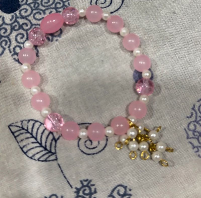 Charming Pink Beaded Bracelet with Charms
