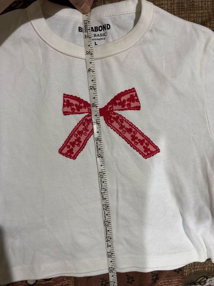 White T-Shirt with Red Bow Detail