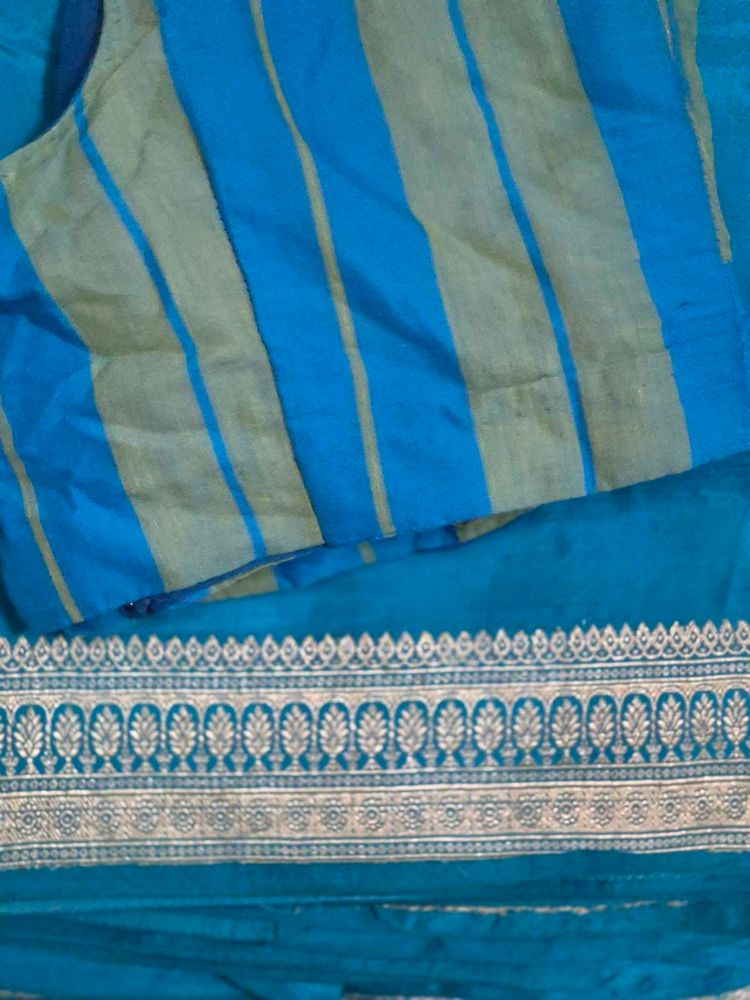 Vibrant Teal Saree with Striped Blouse