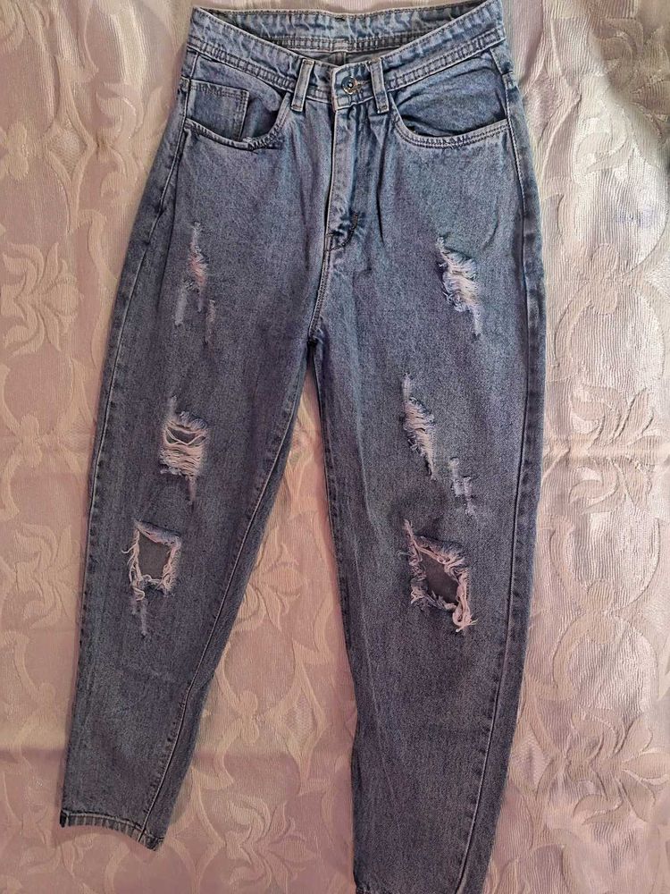 Distressed Blue Denim Jeans