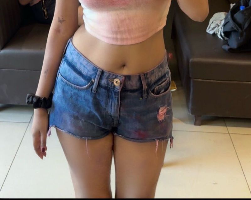 blue ripped denims short