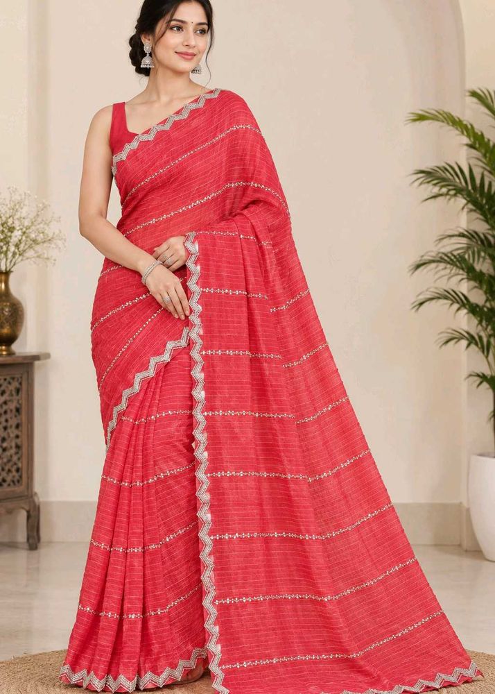 Stunning Coral Saree with Silver Embellishments