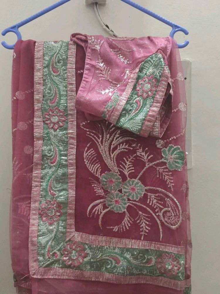 beautiful light magenta saree with stich blows and