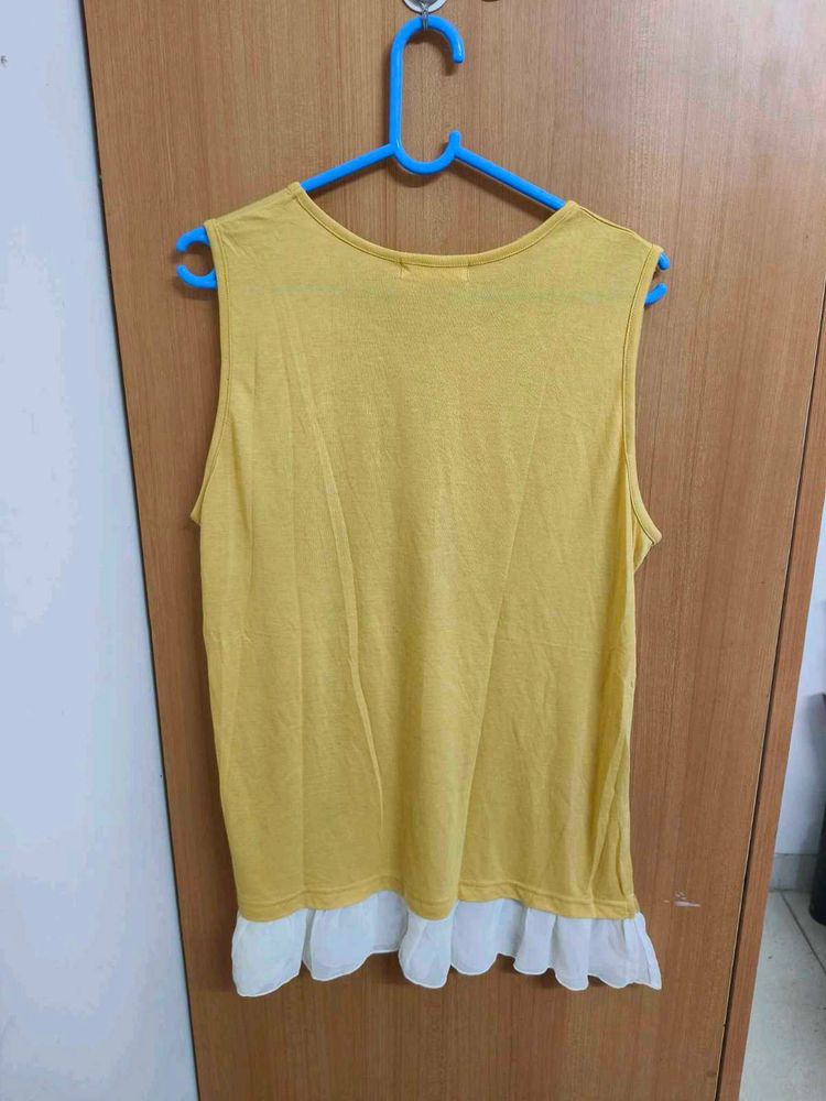 Yellow Sleeveless Top with Ruffle Hem